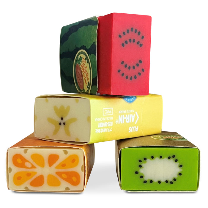 Four Air-In erasers displayed: watermelon, orange, banana, kiwi