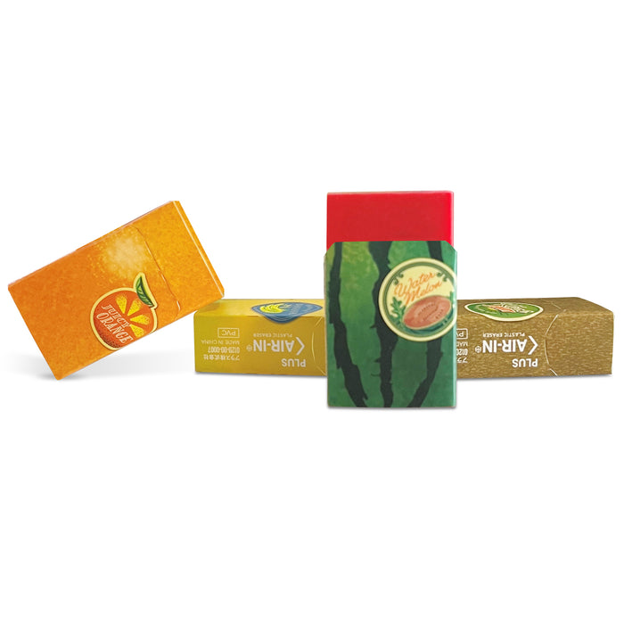 Four Air-In erasers displayed: watermelon, orange, banana, kiwi