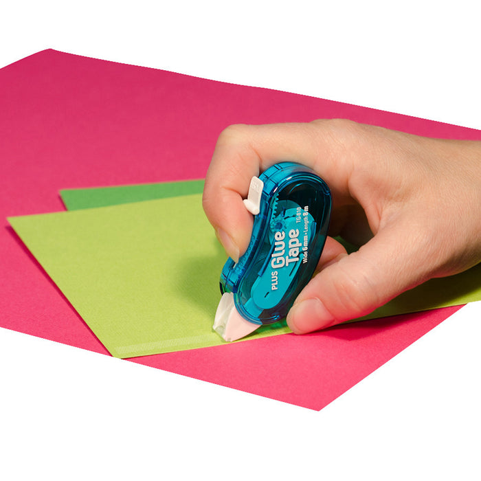 Applying 6 mm glue tape from TG‑810 The Bean to a journal page