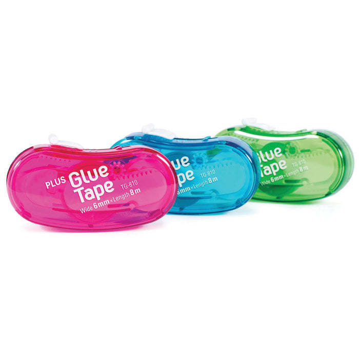 Three colorful PLUS TG‑810 The Bean glue tape applicators in pink, green, and blue