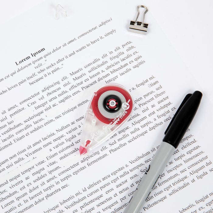 PLUS Correction Tape Mini applicator dispensing correction tape