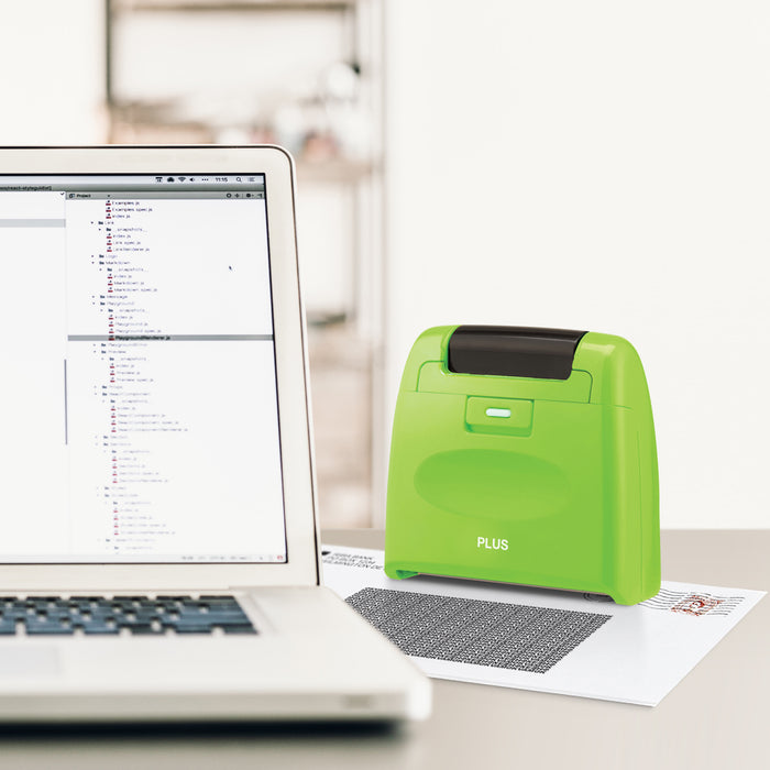 A green Guard Your ID roller security kit with an extra wide roller, along with its cap and ink pattern.
