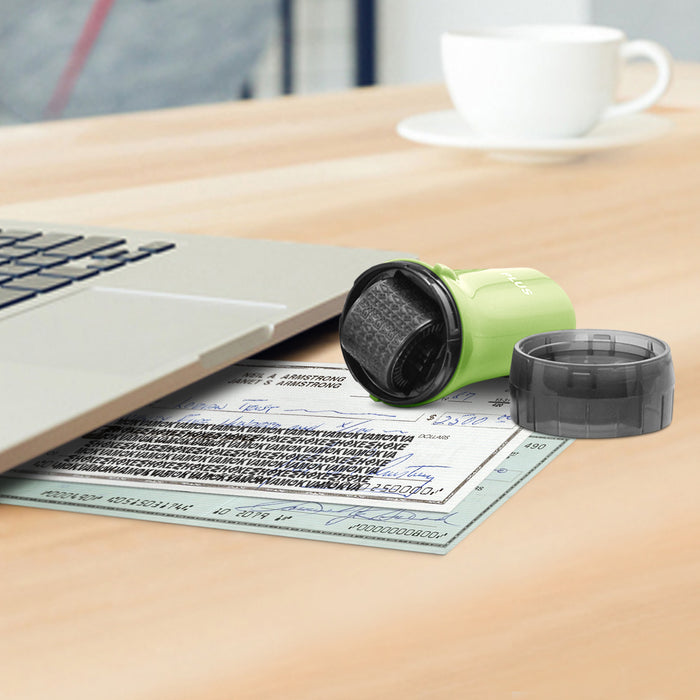 A  green Guard Your ID roller security kit with an extra wide roller, along with its cap and ink pattern