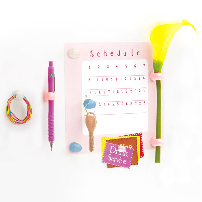 Plus large magnet hooks in blue and white holding things