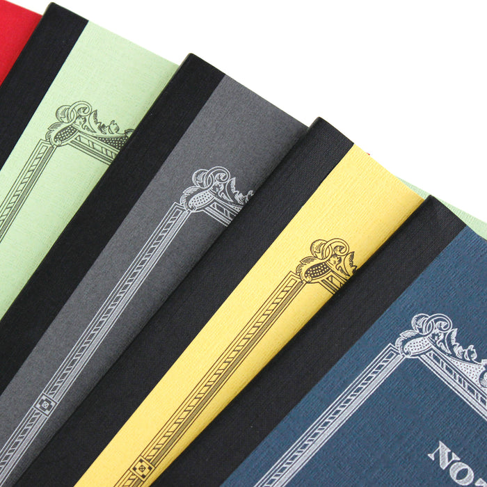 Four Apica A6 Mini Notebooks with vintage-inspired covers assorted colors