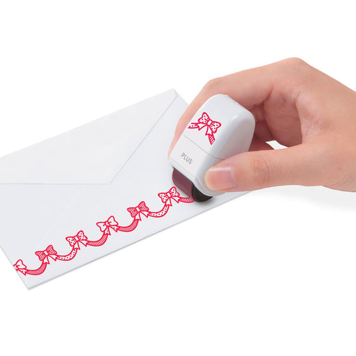 Mini Deco Roller in use creating a border on paper